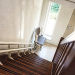 Automatic,stairlift,on,staircase,for,elderly,or,disability,in,a